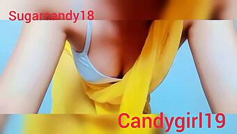 Sensual Candy In Traditional Attire Indulges In Explicit Conversation And Pleasurable Self-Stimulation