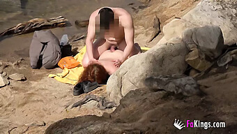 Redheaded Girl Enjoys A Beachside Shower With Cum