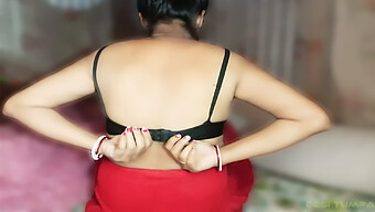 Indian Housewife In Red Dress Engages In Intense Sexual Encounter