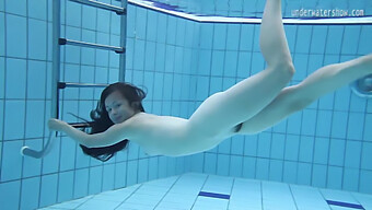 Umora Bajankina, A European Babe, Swims In The Pool Revealing Her Tight And Sexy Pussy