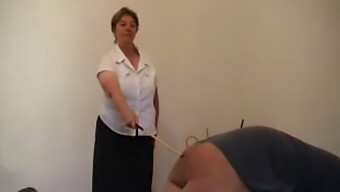 A Mature Woman Punishes A Man With A Cane In Hardcore Scene