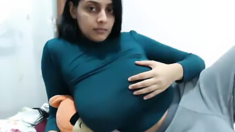 Indian Webcam Performer With Large Breasts Indulges In Self-Pleasure On Camera