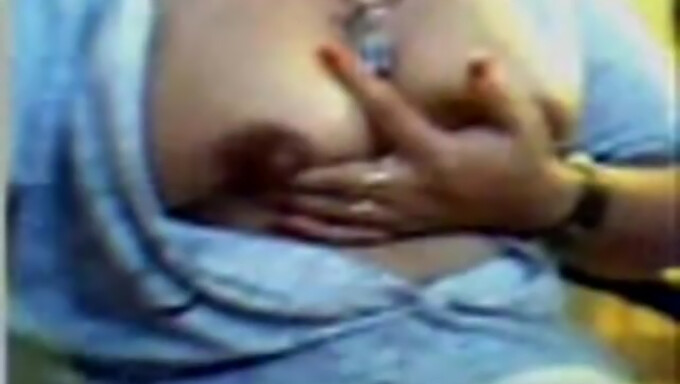 A busty Arab webcam model showcases her curves and natural assets